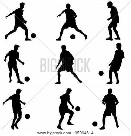 Different Poses Silhouettes Of Soccer Players With The Ball. Vec