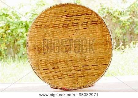 Basketwork contains earthenware steamer and threshing basket.