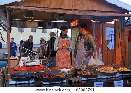 PRAGUE, CZECH REPUBLIC - SEPTEMBER 28, 2015: Wooden stalls with traditional street food in Prague Castle (Hradchany), Prague, Czech Republic.