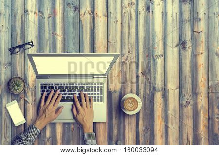 Top View Of Business People Working With Using Digital Laptop Computor, A Cup Of Latte Coffee, Glass