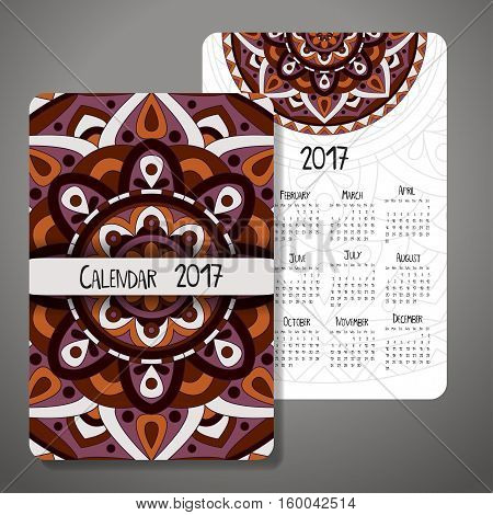 Vector calendar 2017 with decoraive elements. Vector mandala design. Template can be used for web and print design.