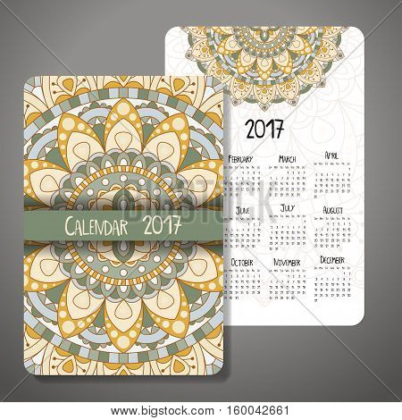 Vector calendar 2017 with decoraive elements. Vector mandala design. Template can be used for web and print design.