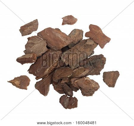 Heap of dry pine tree bark pieces isolated on white. Broken woods nature chip