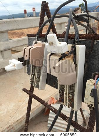 broken vintage retro large electric circuit breaker with protection fuse used outdoor.