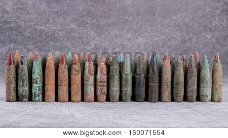 Objects of war, old and rusty bullets.