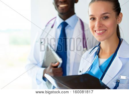 Doctors analyzing an x-ray in a meting