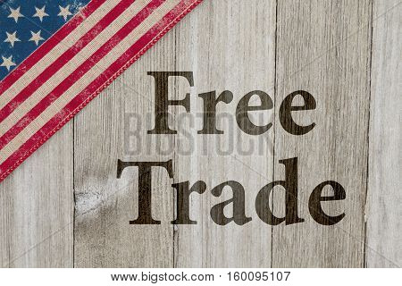 America free trade message USA patriotic old flag on a weathered wood background with text Free Trade