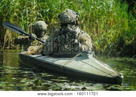 Special forces operators in the military kayak