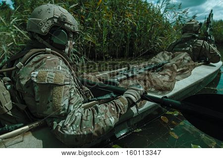 Special forces operators in the military kayak