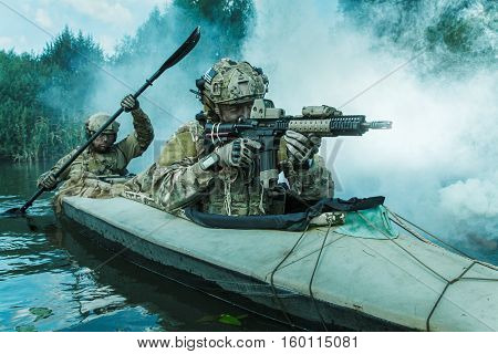 Special forces operators in the military kayak