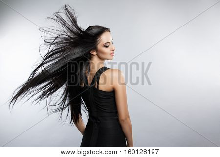Beautiful Girl Model With Developing The Wind Hair.