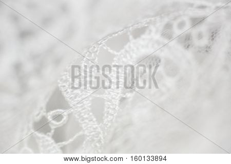 Detail of bright white wedding dress wedding day action