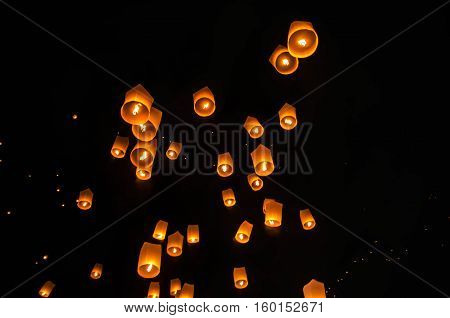 Floating lanterns ceremony or Yee Peng ceremony, traditional Lanna Buddhist ceremony in Chiang Mai, Thailand