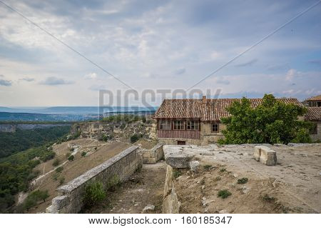 Old stone houses of the medieval town Chufut-Kale in the mountains. Bakhchisarai, Crimea.