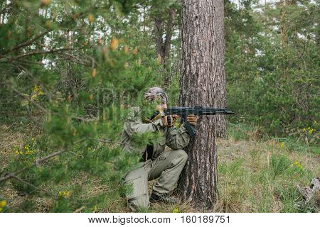 armed men in the area of armed conflict