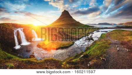 Fantastic evening with Kirkjufell volcano the coast of Snaefellsnes peninsula. Picturesque and gorgeous morning scene. Location famous place Kirkjufellsfoss waterfall, Iceland, Europe. Beauty world.