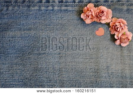 on jeans background laid roses and hearts. Backgrounds Valentine's Day. Wedding background. love card