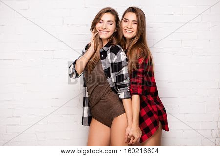 Happy Twins Posing Together.