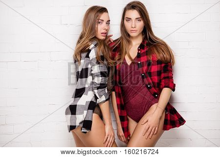 Young Fashionable Girls Posing.