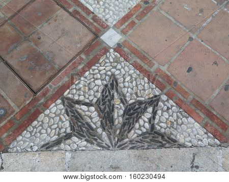 Pebble mosaic in Plaza de Despedida Alora Andalucia