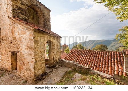 Old walls with arches of Orthodox monastery in Alazani valley, Georgia. Nekresi monastery was erected in 4th - 7th century