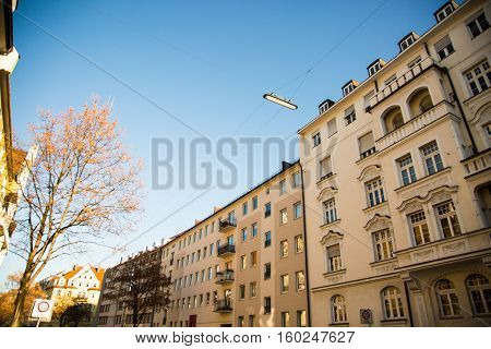 old houses in munich schwabing germany, blue sky