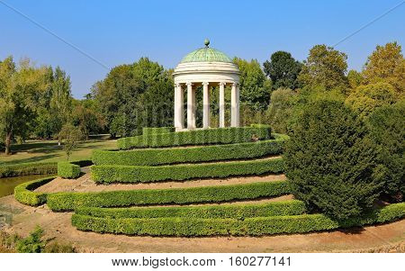 ancient monopteros with the dome in classic style over the public park hill