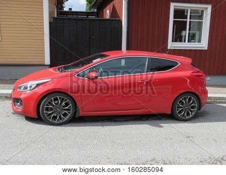 Red Kia Rio Car