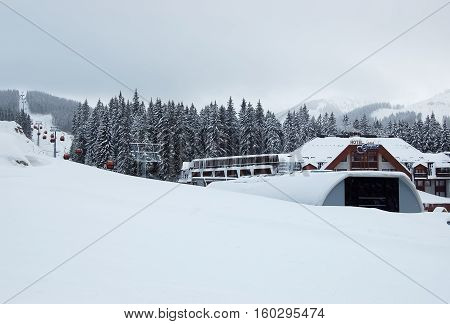 Jasna Slovakia - January 18 2012: View of the cable car and hotel Grand snowy winter in Ski resort Jasna Low Tatras.