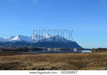 Icelandic village near the Rhyolite Mountains in Iceland.