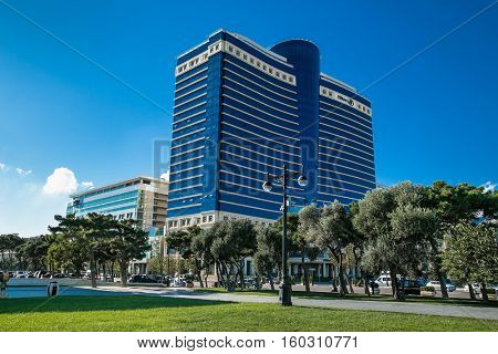 AZERBAIJAN, BAKU, OCT 3, 2016: Freedom Square on the background of the Hilton Hotel on Oct 3, 2016, in Baku. Azerbeijan.