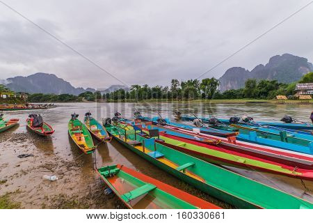 Long Tail Boats On Song River, Vang Vieng, Laos