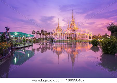 Wat Luang Pho Toh Temple With Water Reflection In Twilight Time, Thailand