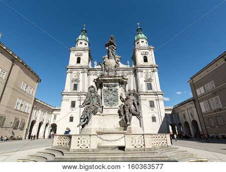 SALZBURG AUSTRIA - APRIL 29 2016: Cathedral of Saints Rupert and Vergilius and Marian column in Domplatz. Salzburg Austria