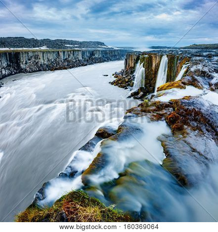 Rapid flow of water powerful Selfoss cascade. Unusual and gorgeous scene. Popular tourist attraction. Location famous place Vatnajokull National Park, Jokulsa a Fjollum, Iceland, Europe. Beauty world.