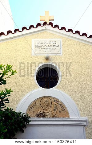 RETHYMNO, CRETE - SEPTEMBER 15, 2016 - Monk sculpture on the wall of St Anthonys church Rethymno Crete Greece Europe, September 15, 2016.