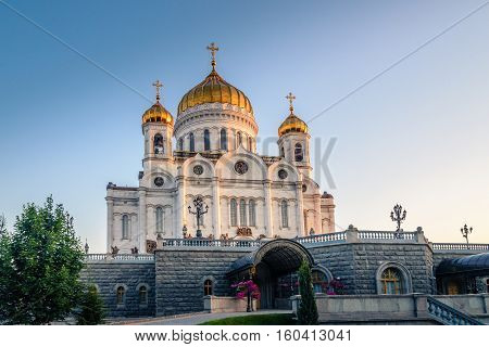 Golden dome of the temple at sunset