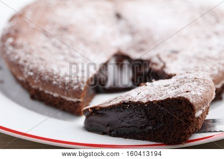 Slice of chocolate mud cake closeup