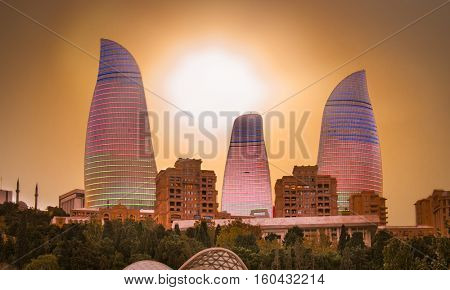BAKU, AZERBAIJAN -OCT 3, 2016: Flame Towers skyscraper on sunset in Baku, Oct 3, 2016,  Azerbaijan. The Flame Towers is the tallest skyscraper in Baku, with a height of 190 m.