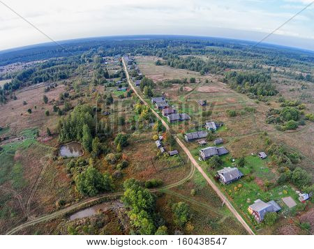 Village in the backwoods of Russia. The view from the top. The village of Popovka one street.