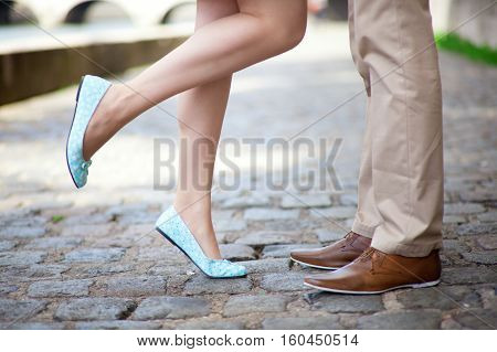 Male And Female Legs During A Date