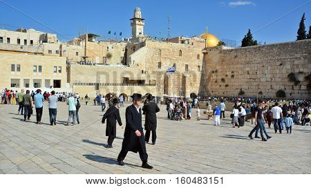 JERUSALEM ISRAEL 26 10 16: Jewish pray a the Western Wall, Wailing Wall the Place of Weeping is an ancient limestone wall in the Old City of Jerusalem. Second Jewish Temple by Herod the Great