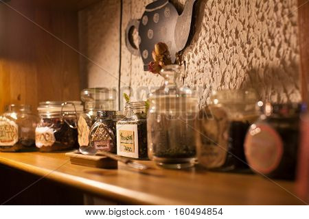 vintage green tea on wooden table glass box