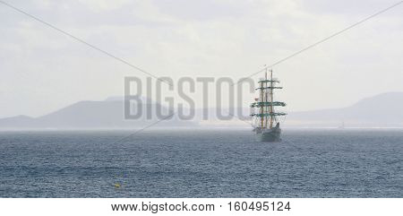 Square Rigged Tall Ship with the Northern Coast of Fuerteventura and the Island of Lobos in the Background