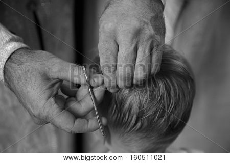 buptism in russian church with child hand