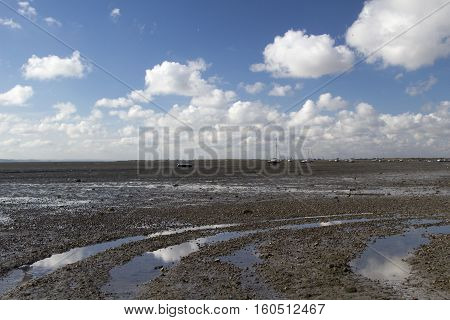 Reflection of clouds on the beach at Leigh-on-Sea near Southend Essex England