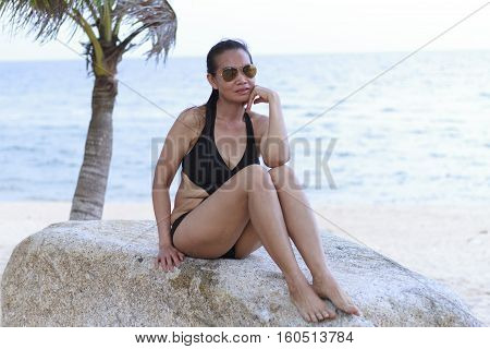 Lady relax pretty in Ban Krut Beach at Prachuap Khirikhun Province Thailand