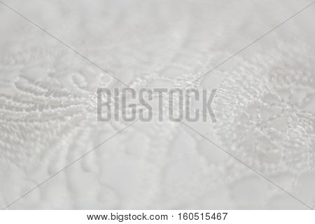 Detail of white wedding dress bright close up