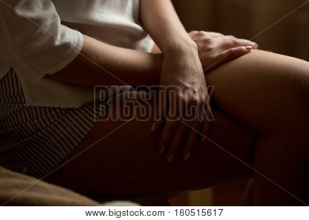 Beautiful hands modeling lying on the knees