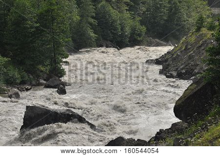 Inguri River. Georgia. Strong current and high level in the river.
